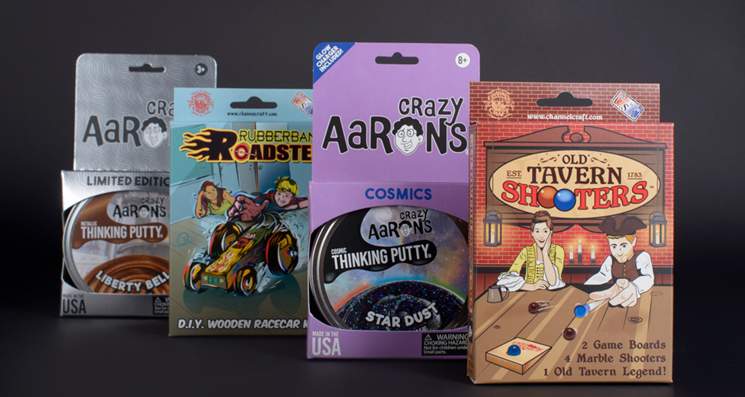 Consumer packaging shown for putty and games